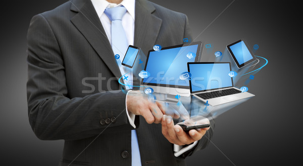 Stock photo: Businessman using modern mobile phone