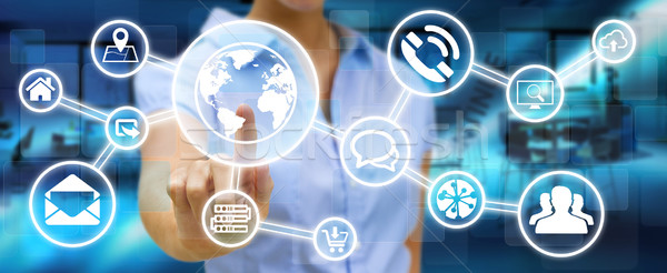 Businesswoman using digital tactile screen interface with web ic Stock photo © sdecoret