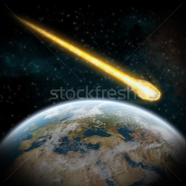 Asteroids over planet earth Stock photo © sdecoret