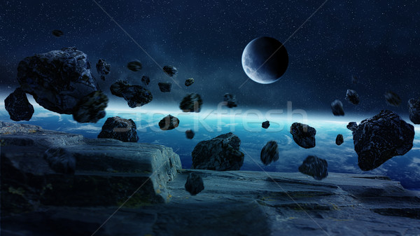 Stock photo: Meteorite impact on planet Earth in space