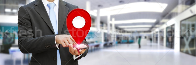 Businessman holding digital map in his hands Stock photo © sdecoret
