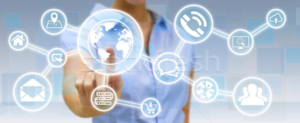 Businesswoman using digital tactile screen interface with web ic Stock photo © sdecoret