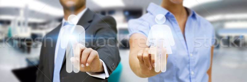 Man and woman using digital interface Stock photo © sdecoret