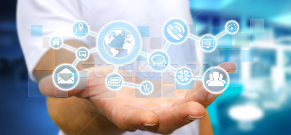 Businessman holding digital tactile screen web network with web  Stock photo © sdecoret