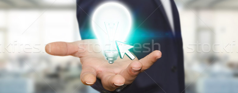 Geschäftsmann halten Glühbirne junger Mann Hand Büro Stock foto © sdecoret