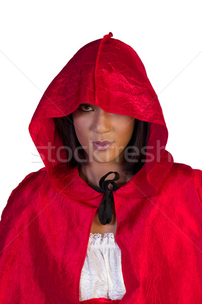 Little red riding hood standing peeping out underneath her hood Stock photo © serendipitymemories