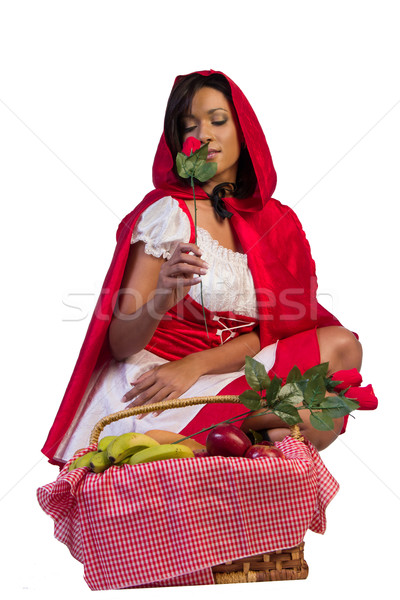 Little red riding hood kneeling behind her basket Stock photo © serendipitymemories