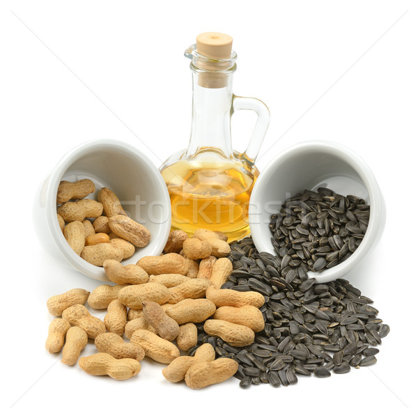 Sunflower seeds, peanuts and oil  Stock photo © serg64
