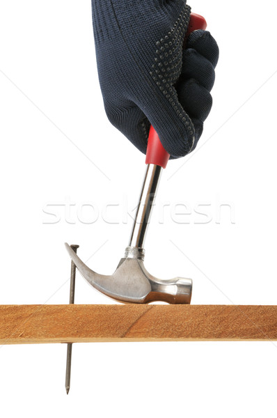 Carpenter pulls a nail. Stock photo © Serg64