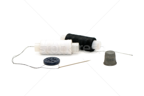 Thread with a needle and a thimble Stock photo © Serg64
