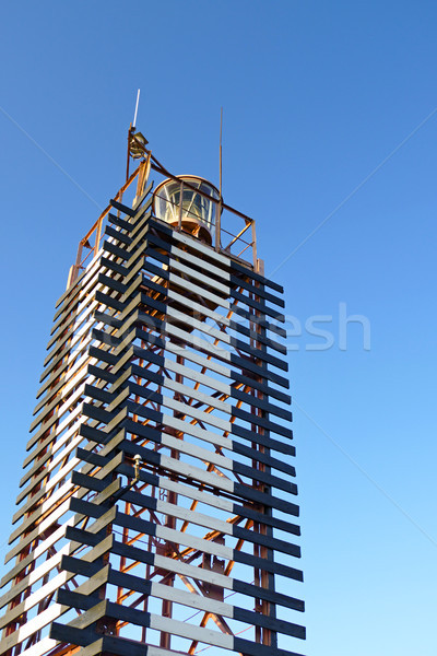 Wooden lighthouse on background sky Stock photo © serg64