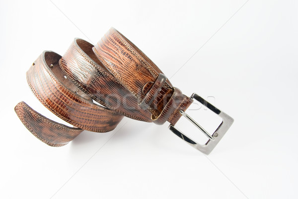 Brown leather belt with chrome-plated buckle Stock photo © serpla