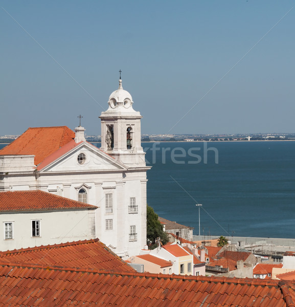 Templom folyópart kerület Lisszabon égbolt ház Stock fotó © serpla
