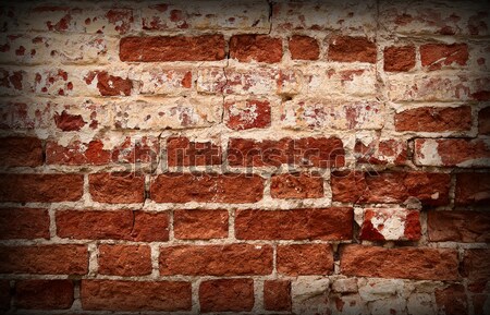 Velho resistiu vermelho parede de tijolos edifício parede Foto stock © serpla