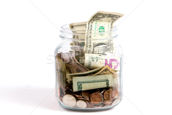 Wskazówka jar dolarów monet szkła ceny Zdjęcia stock © sframe