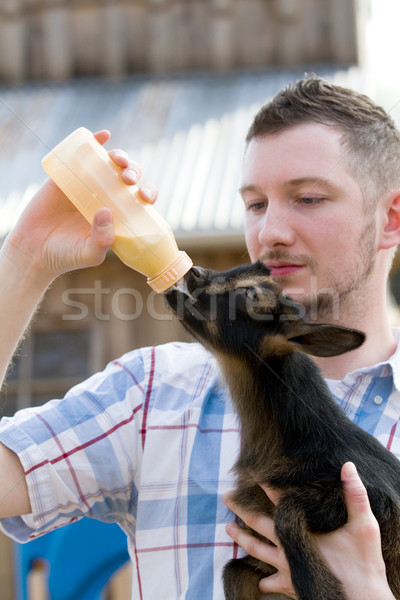 Homme bouteille chèvre bébé nain produits laitiers [[stock_photo]] © sframe