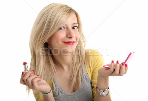 Young blonde with make up tools Stock photo © shamtor
