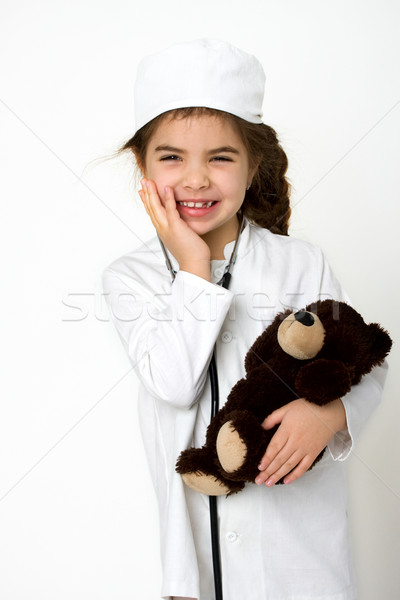 Zdjęcia stock: Dziewczynka · lekarza · biały · uniform · stetoskop · chorych