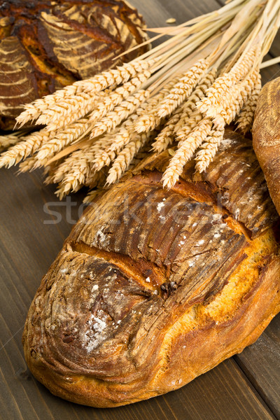 Hand made bread loaves with wheat ears Stock photo © ShawnHempel