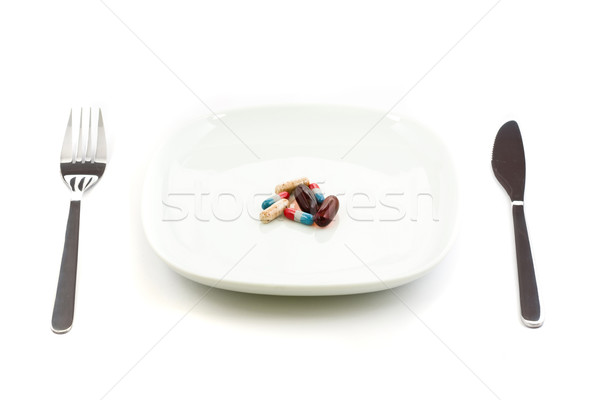 Tabletták tányér ezüst étkészlet izolált fehér gyógyszer Stock fotó © ShawnHempel