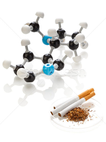 Nicotine molecule with tobacco and cigarettes Stock photo © ShawnHempel