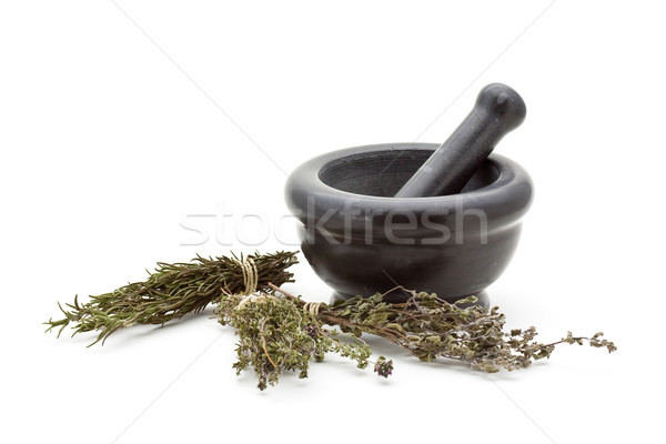 Dried herbs in mortar Stock photo © ShawnHempel