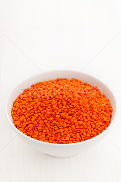 Red lentils in bowl Stock photo © ShawnHempel