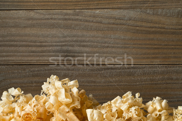 Light brown wood shavings from carpenter's hand planer or chisel Stock photo © ShawnHempel