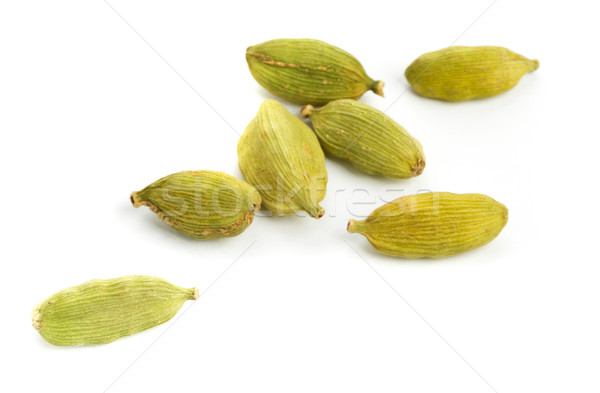 Cardamomo sementi poco profondo campo bianco Foto d'archivio © ShawnHempel