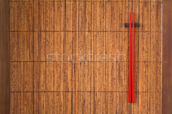 Palillos dos rojo bambú espacio de la copia madera Foto stock © ShawnHempel