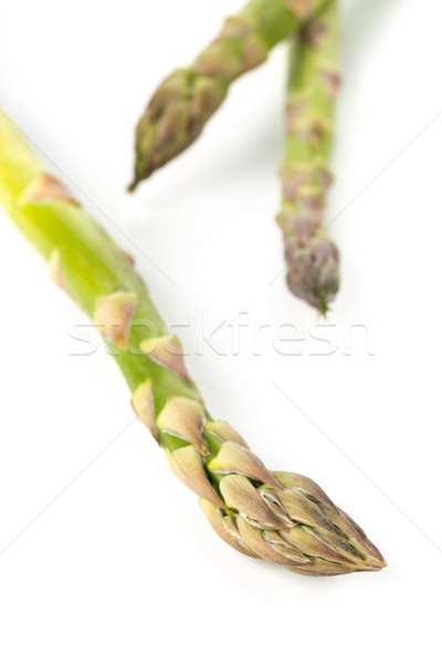 Close up of fresh cut raw, uncooked green asparagus vegetable Stock photo © ShawnHempel