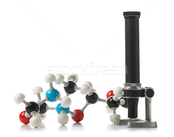 Chemical molecule model with old microscope over white backgroun Stock photo © ShawnHempel