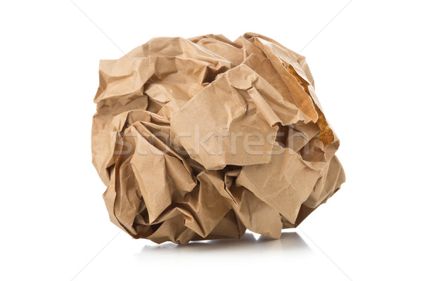 Crumbled brown recycled paper ball on white background  Stock photo © ShawnHempel