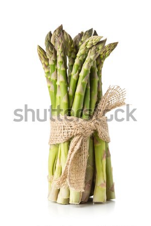 Tied bundle of fresh cut raw, uncooked green asparagus vegetable Stock photo © ShawnHempel