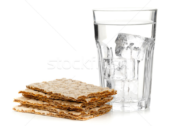Wheat crispbread slices and glass of water Stock photo © ShawnHempel