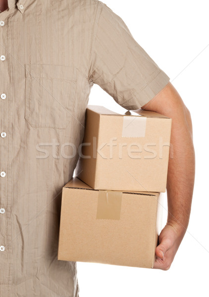 Csomagszállítás férfi tart karton dobozok házhozszállítás Stock fotó © ShawnHempel