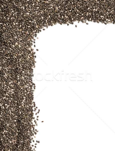 Raw unprocessed whole dried black chia seed corner edge backgrou Stock photo © ShawnHempel