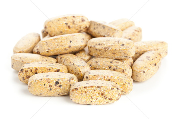 Szárított növénygyűjtemény vitamin kiegészítő tabletták halom fehér Stock fotó © ShawnHempel