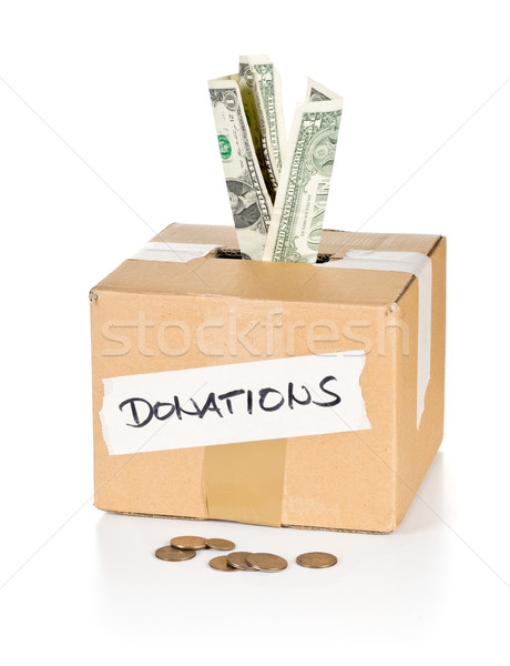 Stock photo: Donation cardboard box with dollar banknotes and coins