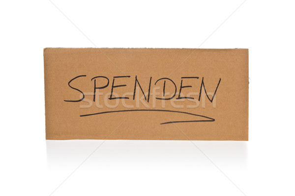 Cardboard sign for donations over white background Stock photo © ShawnHempel