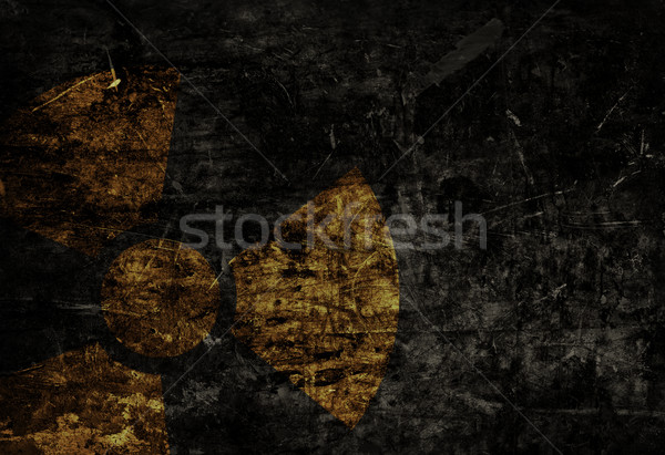 Old grunge distressed black metal plate with radiation warning Stock photo © ShawnHempel