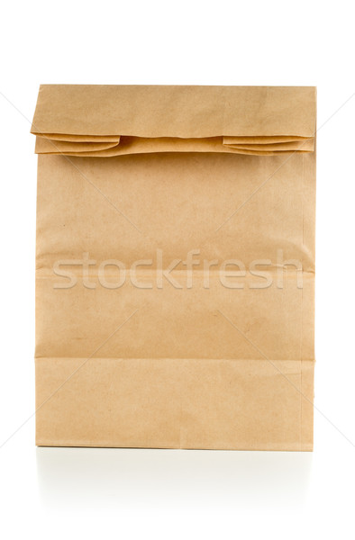 Recycled brown paper doggy bag over white background Stock photo © ShawnHempel