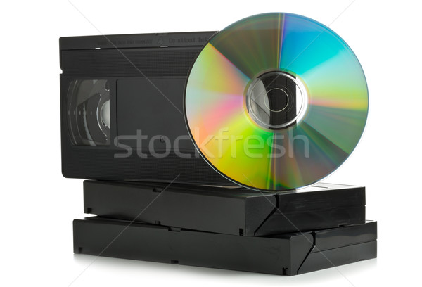 Stack of analog video cassettes with DVD disc Stock photo © ShawnHempel