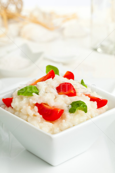 Tomate albahaca risotto blanco tazón mesa Foto stock © ShawnHempel