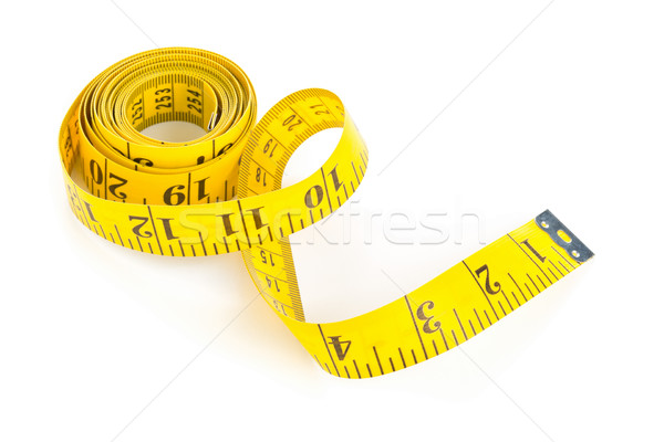 Yellow measure tape on white background Stock photo © ShawnHempel