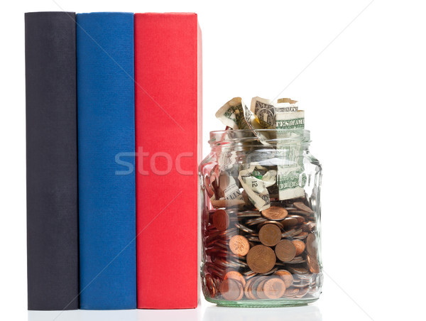 éducation financement livres penny jar pièces Photo stock © ShawnHempel