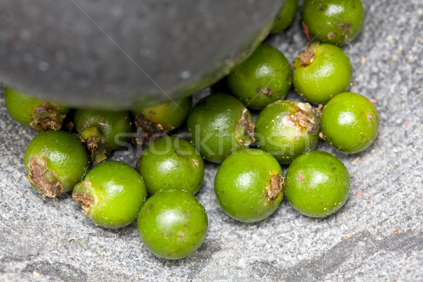 Green peppercorns in mortar Stock photo © ShawnHempel