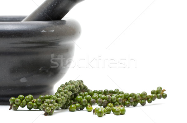 Stock photo: Green peppercorns with mortar