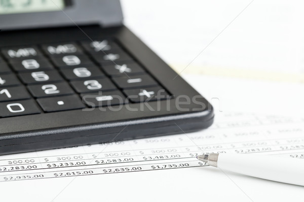 Uitgaven calculator pen papier nummers financieren Stockfoto © ShawnHempel