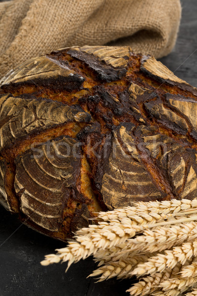 Hand made bread loaf with wheat ears Stock photo © ShawnHempel